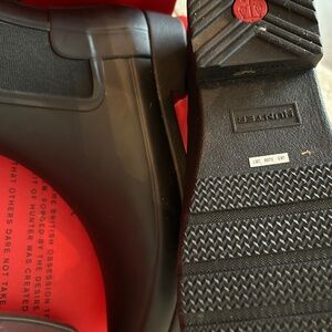Hunter low rain boots.  Brand new with tags, box and boot shine